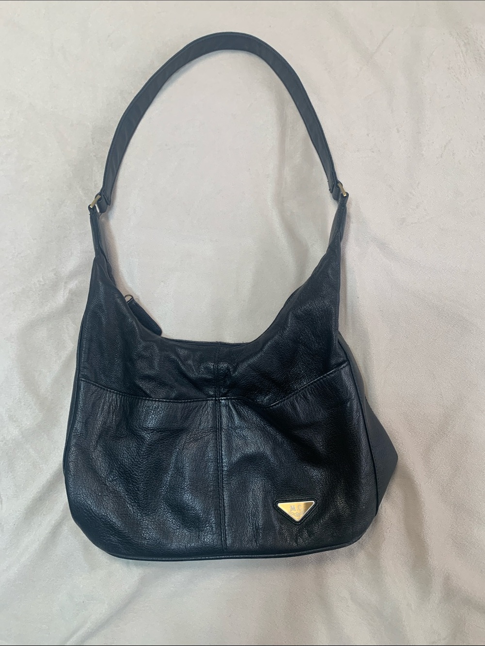 Black Leather Shoulder Hobo Bag with Gold Emblem